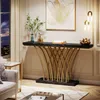 A modern living room with a console table, sofa, and artwork. Produktbild-Vorschau