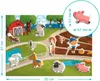 A colorful farm scene with various magnetic animal and human figures. Podgląd zdjęcia produktu