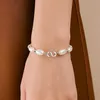 20 Mini-Karabinerhaken, silber, 16,5 x 9 mm, für Schmuck & DIY Productafbeelding-voorbeeld