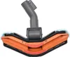 A vacuum cleaner floor nozzle with a gray hose attachment is shown against a white background. Produktbild-Vorschau