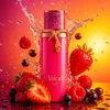 A pink perfume bottle is surrounded by fresh berries and water splashes against a vibrant gradient background. Voir les images du produit