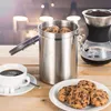 A coffee setup with a vacuum storage container filled with cookies, a cup of coffee, and a pour-over coffee maker. Anteprima dell’immagine prodotto