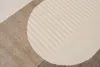 Close-up view of a textured rug with geometric patterns. Produktbild-Vorschau