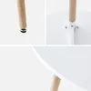 Collage of close-up shots of a table's leg and underside. Anteprima dell’immagine prodotto
