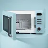 A retro-style blue microwave with the door open, showing the interior and a rack. Podgląd zdjęcia produktu