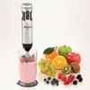 An Ariete immersion blender is shown in a clear beaker with a pink smoothie, surrounded by various fresh fruits and berries. Anteprima dell’immagine prodotto