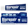 A toothpaste tube and its box packaging. Produktbild-Vorschau
