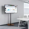 A modern conference room with a TV stand and a large screen displaying charts and video calls. Anteprima dell’immagine prodotto