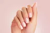 A hand with manicured nails against a plain background. Náhľad obrázku produktu
