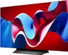 A television screen displaying abstract, colorful ribbons against a red background. Produktbild-Vorschau