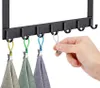 A hand is shown attaching a towel to an over-the-door hook rack. Several other towels are already hanging on the rack. Anteprima dell’immagine prodotto