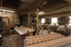 A woodworker in a workshop is working with lumber. Náhľad obrázku produktu