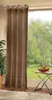 A brown curtain hangs in front of a window with a view of trees and a small table with fruit. Produktbild-Vorschau