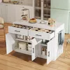A white kitchen island with marble-effect countertop, displaying various kitchen items and storage compartments.