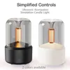Two aroma diffusers, one black and one white, are displayed side-by-side against a white background. Text above describes features and below indicates color options. Podgląd zdjęcia produktu