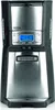 A front view of a black and silver coffee maker with a digital display. Produktbild-Vorschau