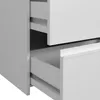 A close-up view of two open drawers of a white cabinet, showing the drawer slides and interior. Produktbild-Vorschau