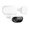 A white security floodlight camera with a black camera housing is shown against a white background. Produktbild-Vorschau