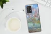 A smartphone with a Van Gogh painting case, a cup of coffee, and earphones on a desk. Produktbild-Vorschau