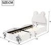 A white children's bed with a bear-shaped headboard and paw-shaped details on the footboard, shown with dimensions indicated. Produktbild-Vorschau