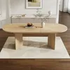 A dining table set in a dining room with a rug underneath. Anteprima dell’immagine prodotto