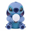 A blue Stitch figurine holding a white ball, presented against a white background. Produktbild-Vorschau