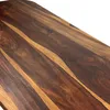 A close-up view of a wooden surface, likely a tabletop or countertop, showing the natural grain and color variations of the wood. Voir les images du produit