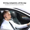A man wearing a white shirt and black tie is driving a car and wearing a black Bluetooth headset. Produktbild-Vorschau