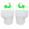 Two white toilets are shown side-by-side with green arrows indicating rotation. Anteprima dell’immagine prodotto