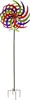 A colorful metal wind spinner on a stand, isolated on a white background. Produktbild-Vorschau