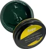 A tin of green shoe polish is shown with the lid open, revealing the cream inside. Produktbild-Vorschau