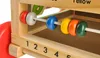 A close-up view of a wooden baby walker with colorful beads on an abacus. Podgląd zdjęcia produktu