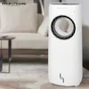 A white and gray air cooler/purifier is placed on a rug in a living room, with a sofa and a side table in the background. Produktbild-Vorschau