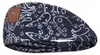 A close-up view of a black and white paisley patterned headband with a small brown square tag on the left side. Produktbild-Vorschau