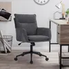 A gray fabric office chair with a black base and wheels is shown in a home office setting. Produktbild-Vorschau