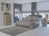 A bedroom with a dresser, bed, and nightstand, with a city view through the window. Produktbild-Vorschau