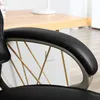 A close-up view of the armrest and internal structure of a black office chair. Produktbild-Vorschau
