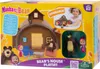 The image shows the packaging of a Masha and the Bear playset, featuring the Bear's house and characters. Náhled obrázku produktu