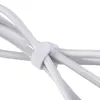 A close-up view of white electrical cables bound together with a white velcro strap. Produktbild-Vorschau