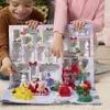 Two children are interacting with a Paw Patrol advent calendar. Podgląd zdjęcia produktu