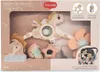 The image shows the retail packaging of a baby stroller toy. The packaging is open, revealing the toy and some of its components. A small inset image shows a baby in a stroller with similar toys attached. Produktbild-Vorschau
