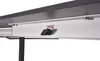 A close-up view of a drawer mechanism on a table, showing a black handle and a small red and white label. Produktbild-Vorschau