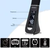 A close-up of a black desk lamp with a digital display showing various functions, accompanied by icons representing different features. Anteprima dell’immagine prodotto