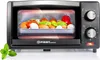 A tabletop oven with food inside and a sprig of mint in the foreground. Voir les images du produit
