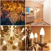 A collage of four images showing different aspects of lighting and home decor, including chandeliers, hallway decor, and close-ups of LED bulbs. Produktbild-Vorschau