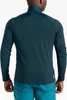 Back view of a man wearing a teal long-sleeved shirt and blue shorts. Produktbild-Vorschau