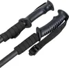 Close-up view of the handles and upper shafts of two black trekking poles. Produktbild-Vorschau
