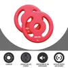 Two pink weight plates with handles are shown, with icons and text below describing their features. Produktbild-Vorschau