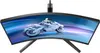 A curved computer monitor displaying a futuristic motorcycle. Produktbild-Vorschau