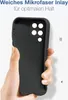 A hand holding a black phone case with a microfiber inlay. Produktbild-Vorschau